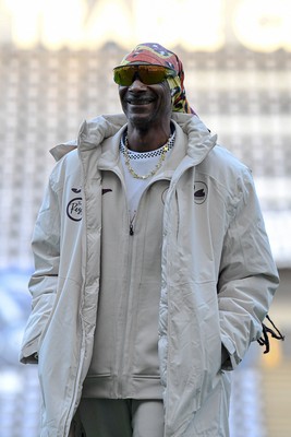 240226 - Swansea City v Preston North End - Sky Bet Championship - Picture shows Swansea City Majority Shareholder Snoop Dogg on his visit to the SwanseaCom Stadium being taken on a tour of the pitch