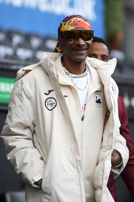 240226 - Swansea City v Preston North End - Sky Bet Championship - Picture shows Swansea City Majority Shareholder Snoop Dogg on his visit to the SwanseaCom Stadium being taken on a tour of the pitch