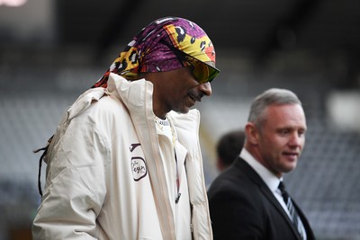 240226 - Swansea City v Preston North End - Sky Bet Championship - Picture shows Swansea City Majority Shareholder Snoop Dogg on his visit to the SwanseaCom Stadium being taken on a tour of the pitch
