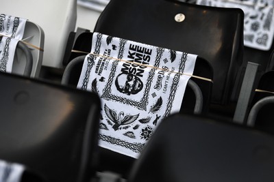 240226 - Swansea City v Preston North End - Sky Bet Championship - Picture shows Snoop Dogg flags on seats in the stadium