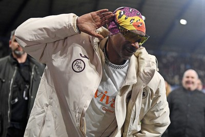 240226 - Swansea City v Preston North End - Sky Bet Championship - Snoop Dogg walks around the pitch before the game