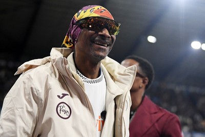 240226 - Swansea City v Preston North End - Sky Bet Championship - Snoop Dogg walks around the pitch before the game