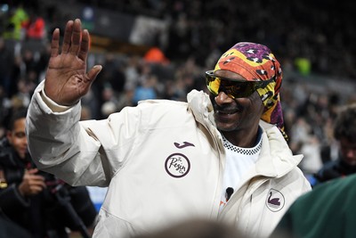 240226 - Swansea City v Preston North End - Sky Bet Championship - Snoop Dogg walks around the pitch before the game