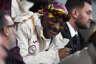 240226 - Swansea City v Preston North End - Sky Bet Championship - Snoop Dogg reacts after Swansea miss an opportunity