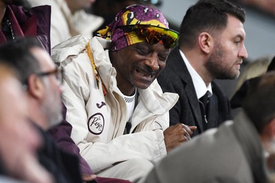 240226 - Swansea City v Preston North End - Sky Bet Championship - Snoop Dogg reacts after Swansea miss an opportunity