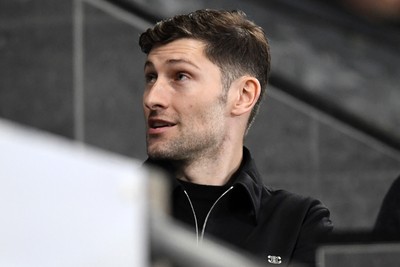 240226 - Swansea City v Preston North End - Sky Bet Championship - Wales Captain Ben Davies watches the game