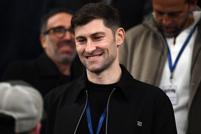 240226 - Swansea City v Preston North End - Sky Bet Championship - Wales Captain Ben Davies watches the game