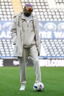240226 - Swansea City v Preston North End - Sky Bet Championship - Picture shows Swansea City Majority Shareholder Snoop Dogg on his visit to the SwanseaCom Stadium being taken on a tour of the pitch