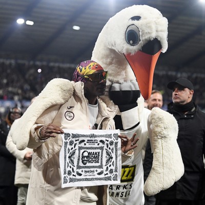 240226 - Swansea City v Preston North End - Sky Bet Championship - Snoop Dogg walks around the pitch before the game