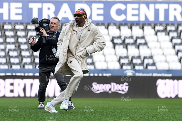 240226 - Swansea City v Preston North End - Sky Bet Championship - Picture shows Swansea City Majority Shareholder Snoop Dogg on his visit to the SwanseaCom Stadium being taken on a tour of the pitch