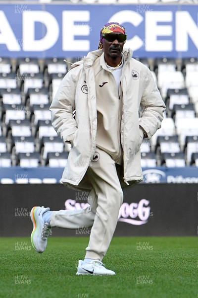 240226 - Swansea City v Preston North End - Sky Bet Championship - Picture shows Swansea City Majority Shareholder Snoop Dogg on his visit to the SwanseaCom Stadium being taken on a tour of the pitch