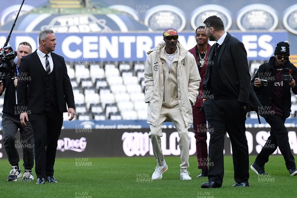 240226 - Swansea City v Preston North End - Sky Bet Championship - Picture shows Lee Trundle (Left) and Swansea City Majority Shareholder Snoop Dogg on his visit to the SwanseaCom Stadium being taken on a tour of the pitch