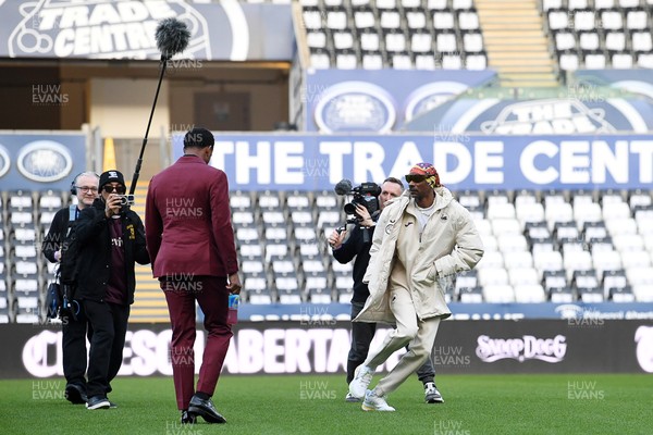 240226 - Swansea City v Preston North End - Sky Bet Championship - Picture shows Swansea City Majority Shareholder Snoop Dogg on his visit to the SwanseaCom Stadium being taken on a tour of the pitch