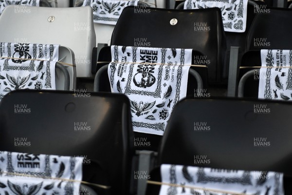 240226 - Swansea City v Preston North End - Sky Bet Championship - Picture shows Snoop Dogg flags on seats in the stadium