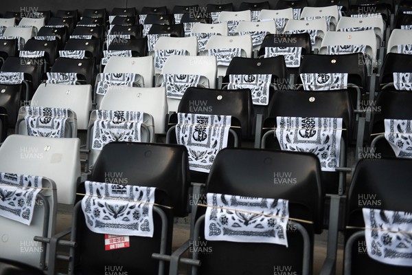 240226 - Swansea City v Preston North End - Sky Bet Championship - Picture shows Snoop Dogg flags on seats in the stadium