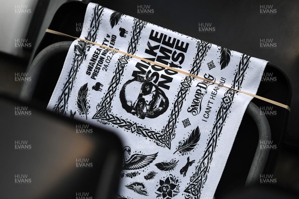 240226 - Swansea City v Preston North End - Sky Bet Championship - Picture shows Snoop Dogg flags on seats in the stadium