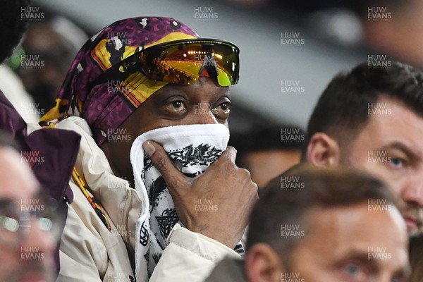 240226 - Swansea City v Preston North End - Sky Bet Championship - Snoop Dogg watches the game while covering his face after Preston score the opening goal