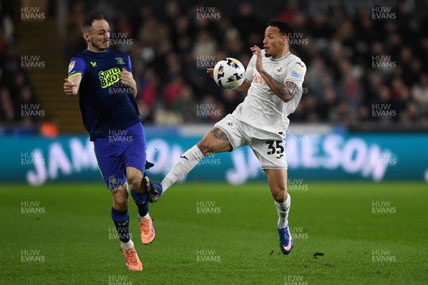 240226 - Swansea City v Preston North End - Sky Bet Championship - Ronald of Swansea City is challenged by Andrija Vukcevic of Preston