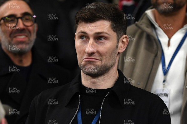 240226 - Swansea City v Preston North End - Sky Bet Championship - Wales Captain Ben Davies watches the game