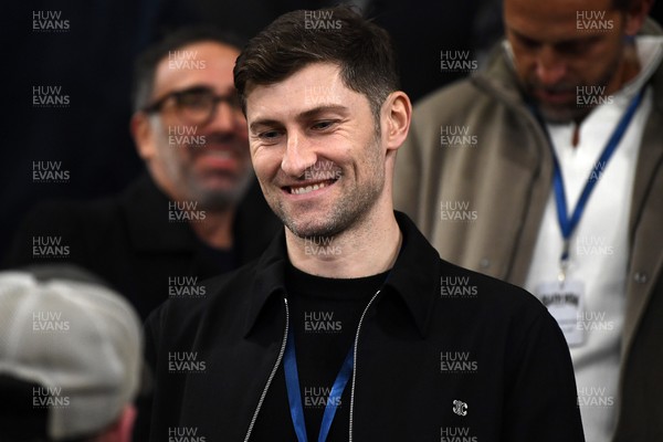 240226 - Swansea City v Preston North End - Sky Bet Championship - Wales Captain Ben Davies watches the game