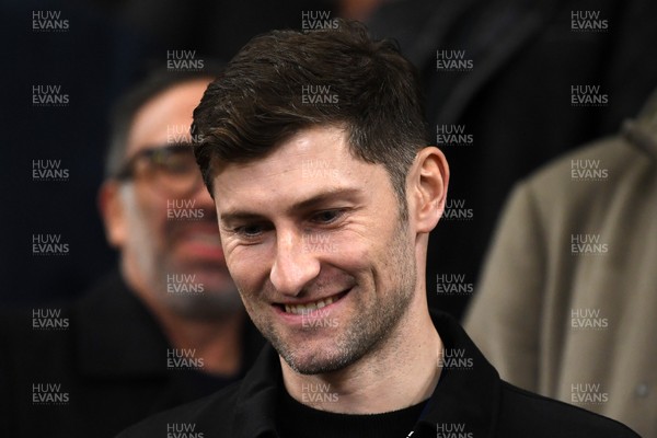 240226 - Swansea City v Preston North End - Sky Bet Championship - Wales Captain Ben Davies watches the game