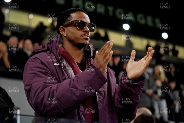 240226 - Swansea City v Preston North End - Sky Bet Championship - Snoop Dogg’s Son, Cordell Broadus applauding Swansea’s efforts at full time