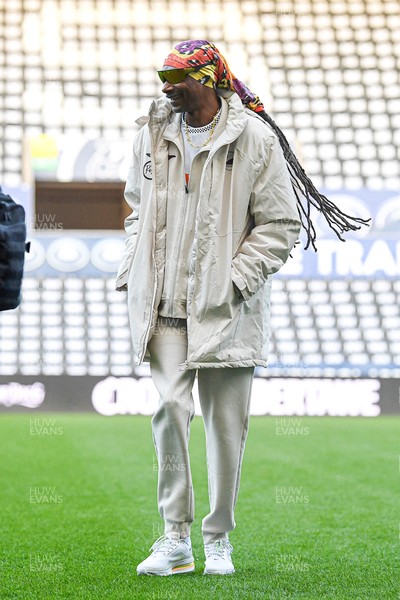 240226 - Swansea City v Preston North End - Sky Bet Championship - Picture shows Swansea City Majority Shareholder Snoop Dogg on his visit to the SwanseaCom Stadium being taken on a tour of the pitch