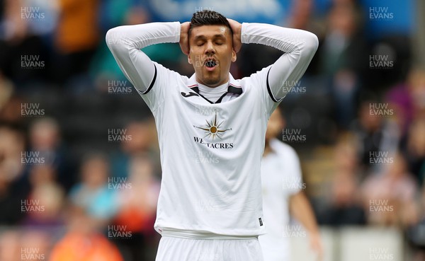 030922 - Swansea City v Queens Park Rangers - SkyBet Championship - Dejected Joel Piroe of Swansea City after his penalty is saved by keeper Seny Dieng of QPR