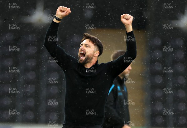030922 - Swansea City v Queens Park Rangers - SkyBet Championship - Swansea City Manager Russell Martin celebrates the victory on the field at full time