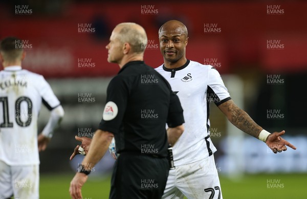 110220 - Swansea City v Queens Park Rangers, Sky Bet Championship - Andre Ayew of Swansea City addresses the referee Andy Woolmer at the end of the match