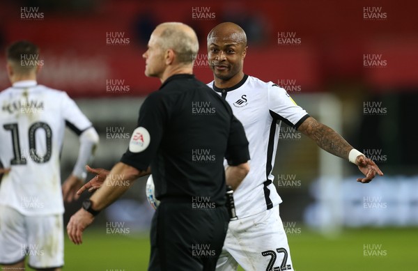 110220 - Swansea City v Queens Park Rangers, Sky Bet Championship - Andre Ayew of Swansea City addresses the referee Andy Woolmer at the end of the match