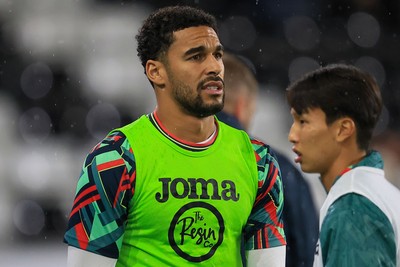 221025 - Swansea City v Queens Park Rangers - Sky Bet Championship - Ben Cabango of Swansea City warming up before game