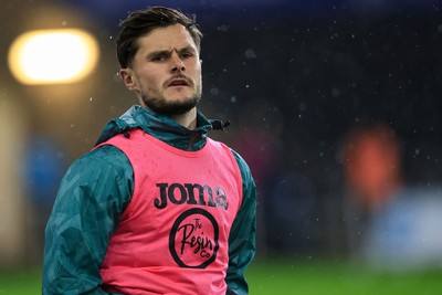 221025 - Swansea City v Queens Park Rangers - Sky Bet Championship - Liam Cullen of Swansea City warming up before game