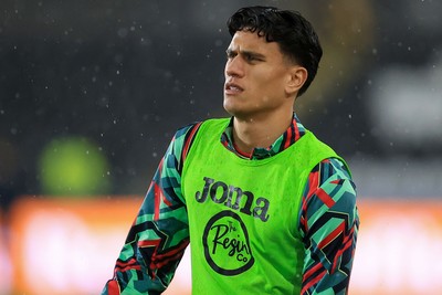 221025 - Swansea City v Queens Park Rangers - Sky Bet Championship - Marko Stamenic of Swansea City warming up before game