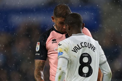 221025 - Swansea City v Queens Park Rangers - Sky Bet Championship - Malick Yalcouye of Swansea City clashes with Steve Cook of Queens Park Rangers