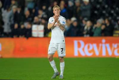 221025 - Swansea City v Queens Park Rangers - Sky Bet Championship - Melker Widell of Swansea City applauds fans after the game