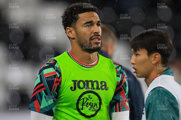 221025 - Swansea City v Queens Park Rangers - Sky Bet Championship - Ben Cabango of Swansea City warming up before game