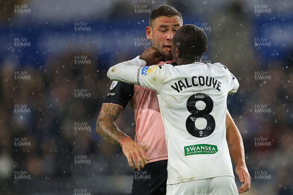 221025 - Swansea City v Queens Park Rangers - Sky Bet Championship -  Malick Yalcouye of Swansea City clashes with Steve Cook of Queens Park Rangers