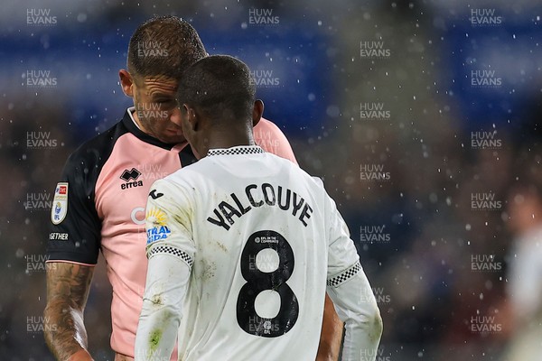 221025 - Swansea City v Queens Park Rangers - Sky Bet Championship -  Malick Yalcouye of Swansea City clashes with Steve Cook of Queens Park Rangers