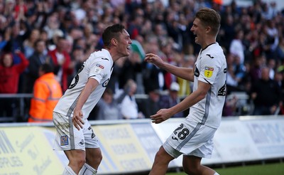 290918 - Swansea City v Queens Park Rangers - SkyBet Championship - Connor Roberts celebrates scoring a goal with George Byers of Swansea City