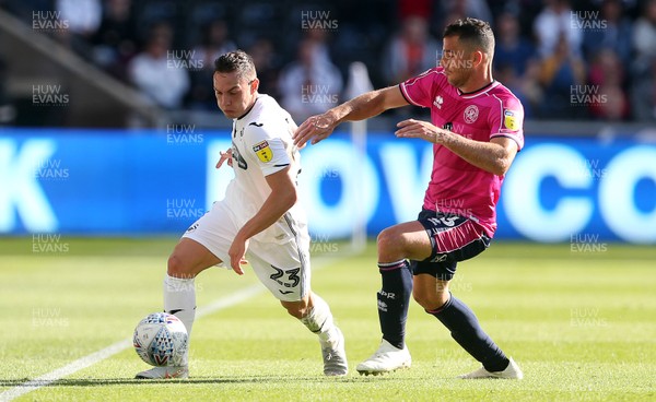 290918 - Swansea City v Queens Park Rangers - SkyBet Championship - Connor Roberts of Swansea City is challenged by Sean Goss of Queens Park Rangers