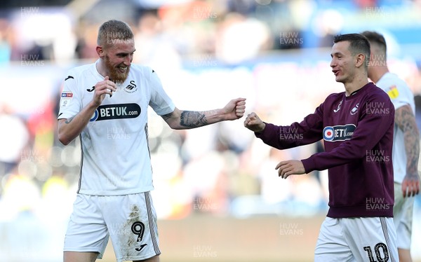 290918 - Swansea City v Queens Park Rangers - SkyBet Championship - Oli McBurnie and Bersant Celina of Swansea City at full time