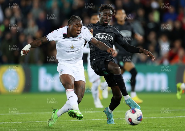 181022 - Swansea City v Reading - SkyBet Championship - Michael Obafemi of Swansea City is tackled by Amadou Mbengue of Reading