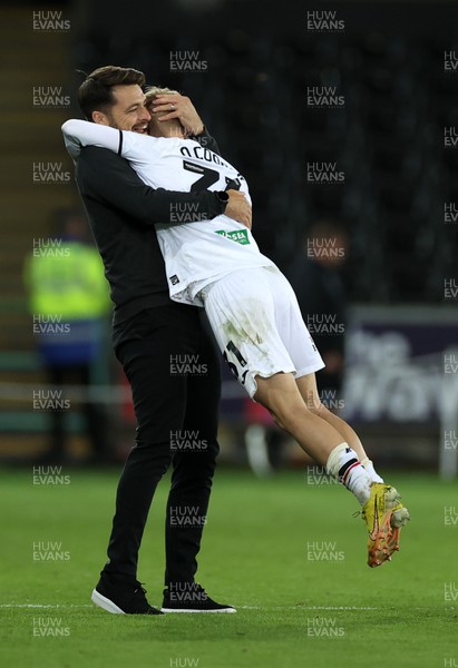 181022 - Swansea City v Reading - SkyBet Championship - Swansea City Manager Russell Martin celebrates with Ollie Cooper at full time