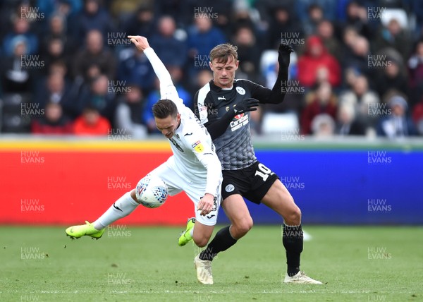 271018 - Swansea City v Reading - SkyBet Championship - Connor Roberts of Swansea City is tackled by John Swift of Reading
