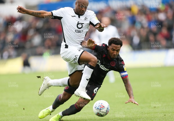 280919 - Swansea City v Reading, SkyBet Championship - Andre Ayew of Swansea City is challenged by Liam Moore of Reading