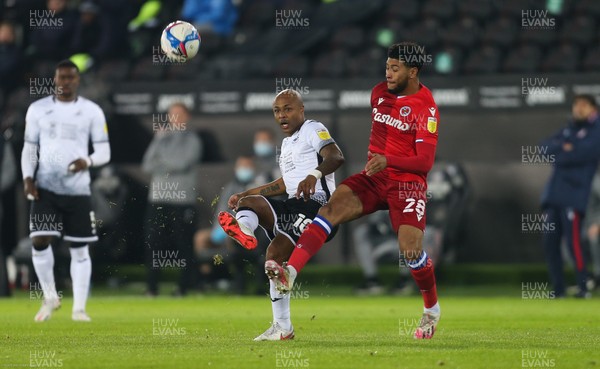 301220 - Swansea City v Reading, Sky Bet Championship - Andre Ayew of Swansea City plays the ball past Josh Laurent of Reading