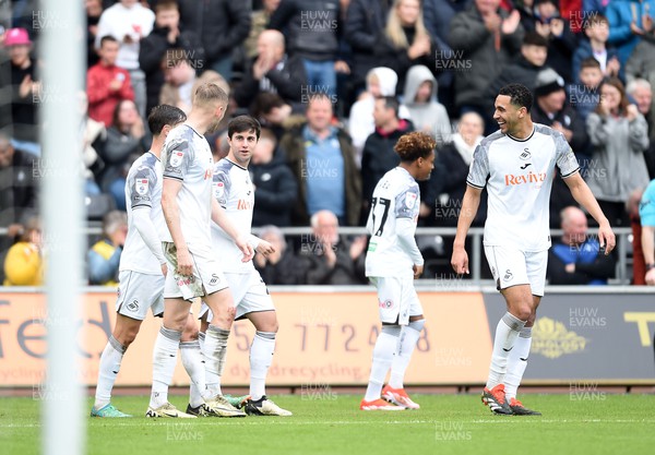 130424 - Swansea City v Rotherham United - Sky Bet Championship - Swansea City celebrate following a Andy Rinomhota of Rotherham own goal 