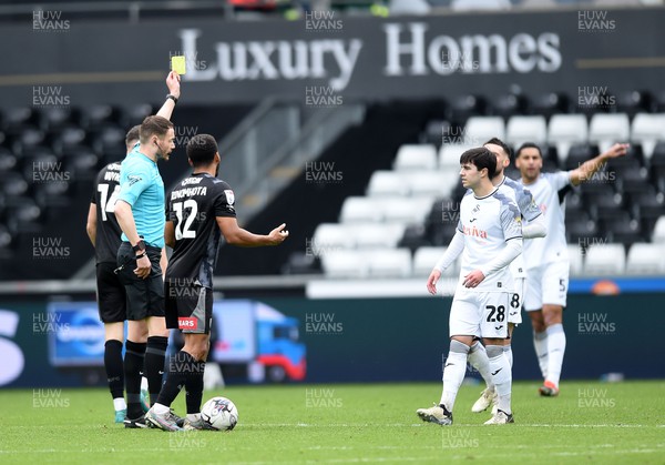 130424 - Swansea City v Rotherham United - Sky Bet Championship - Jay Fulton of Swansea City receives a yellow card from referee Leigh Doughty