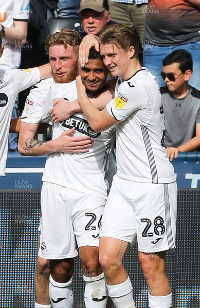 190419 - Swansea City v Rotherham United, Sky Bet Championship - George Byers of Swansea City, right, celebrates with Kyle Naughton of Swansea City after Swansea's third goal
